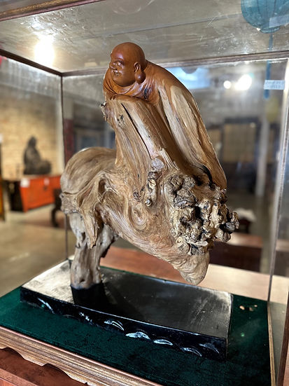 Thuja Wood Buddha Sculpture encased in Glass Box